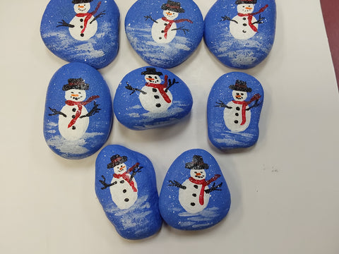 snowman with blue background and snow