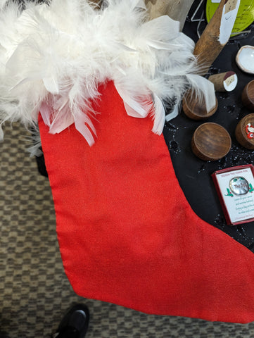 Red stocking with feathers