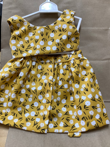 2  Piece yellow gold top and skirt  with Velcro Closures.