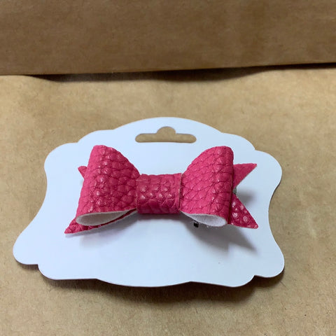 Darker pink faux leather bow barrette by B