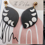 Moon phase earrings by Barbie