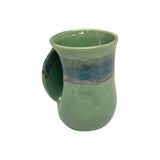 Clay in Motion - The Original Handwarmer Mug: Cobalt Canyon / Right Hand