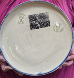 Kirsten White rimmed plate with small decals