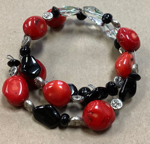 Red, Black, and Clear Beads on a Wire Wrap by Kellee