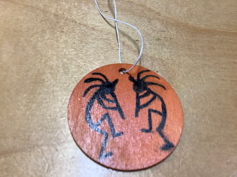 Kokopelli Hand painted Wooden Disc by Cecelia.