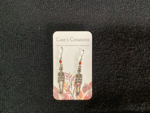 Silver Skeleton Earrings by  Caitlin (Orange Bead)