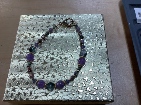 Purple jeweled bracelet by Caitlyn