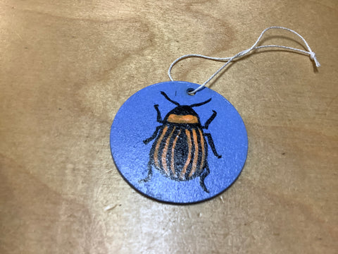 Hand painted  Bug on Wooden Disc by Cecelia. ( 1 per purchase)