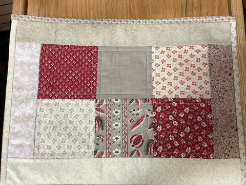 Beige and Red Placemat by Carol