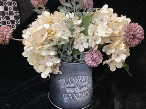 Flower  Arrangement in a Small Tin Pitcher by Lisa