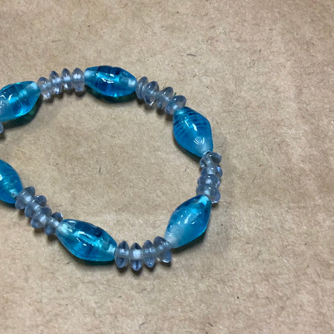 Two shades of Blue glass beads on stretch cord