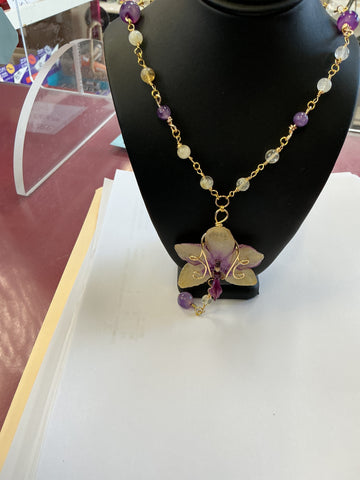Real Orchid in Resin with gold findings by Rhowdeshia