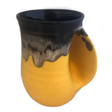 Clay in Motion - The Original Handwarmer Mug: Black and Brown / Left Hand