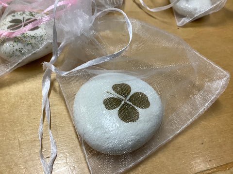 4 leaf clover rock in bag by local artist Kevin