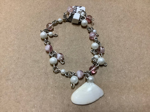 Gemstone bracelet with white and pink gemstones.  by local artist Rowdeisha