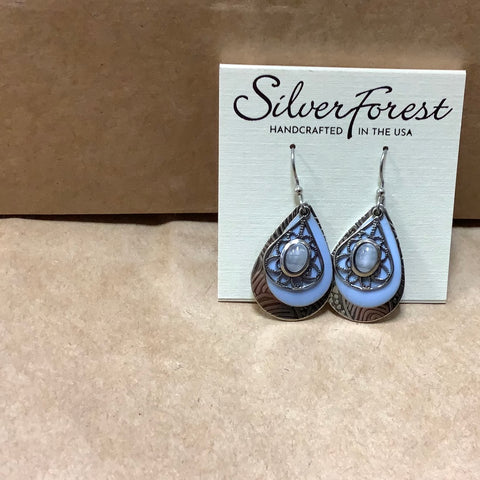 NE-0792B. Handcrafted by Silver Forest in Vermont. Silver layers With blue disc and stone.
