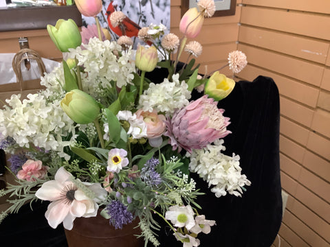 Flower Arrangement in a Rusty Tin Bucket by Lisa