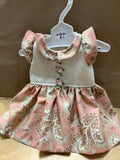 peach and gold paisley doll dress made by local artist Carol