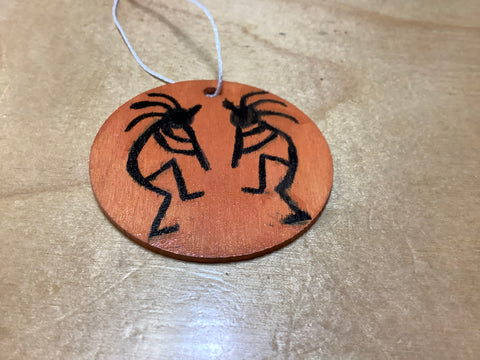Kokopelli Hand painted Wooden Disc by Cecelia.