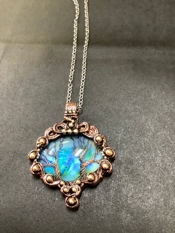 Pendant with 18”Chain.  Picture of tree in center. Gus