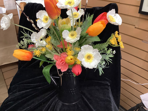 Flower Arrangement in a Tin Watering Can by Lisa