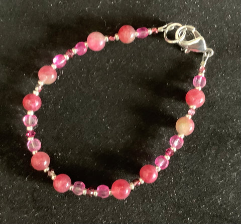 Many Shades of Pink Beads with a Silver Clasp Bracelet by Caitlin