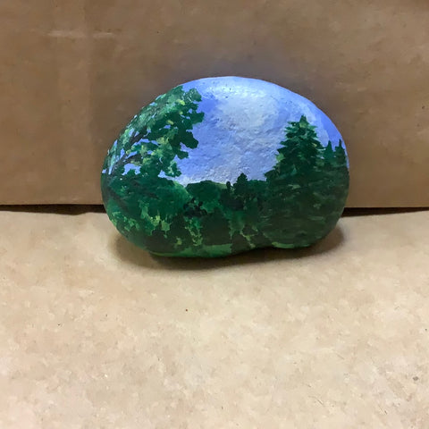 Painted Rock With Green Trees  and blue sky by Cecelia.