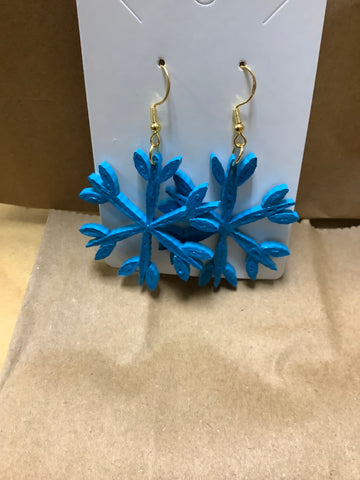 Quill art earrings blue snowflake by local artist Autumn.