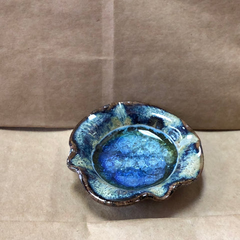 Handmade little dishes from Pottery and recycled glass in Colorado.  3 1/2 “ in diameter.  Makes a great gift or use as a ring holder, coins, incense,votive many more things.