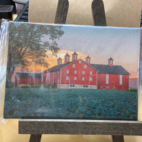 Red Barn with sunrise in background