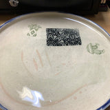 Kirsten White rimmed plate with small decals