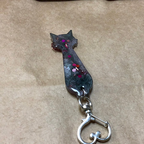 Thin small cat keychain.