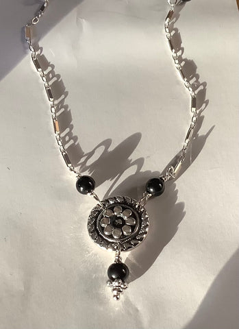 Black Oynx Pinwheel necklace by Mary Kay Donnelly