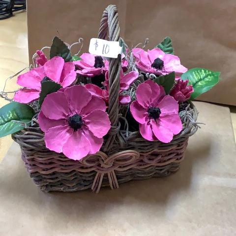 Basket of pink pine cone flowers by Cecelia