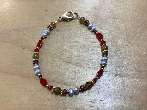 Beaded gemstones gold & reds by Caitlyn