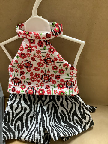 AG Doll Clothes by local artist Carol Zebra shorts with a printed halter top.