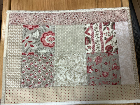 Beige and Rose Colored Placemat by Carol