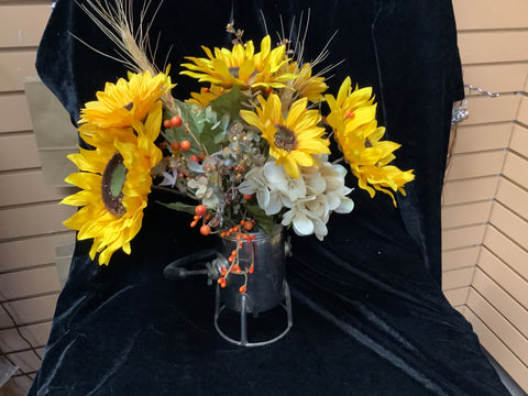 Tin Container filled with Sunflowers and Bittersweet by Lisa