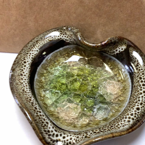 Heart Shaped small dish.  Tones of browns.  Peach green gold recycled glass in center.