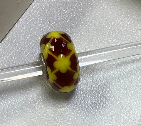 Troll bead brown w/ yellow flower