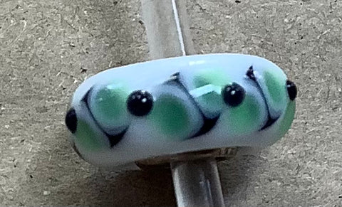 Troll Unique White Bead with a Green Design and Black Dots