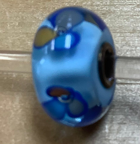 Troll Unique Bead in Blue with a Blue,Beige, and Gray Flower