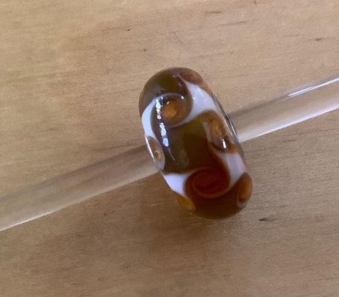 Unique Trollbead Brown/Amber and white