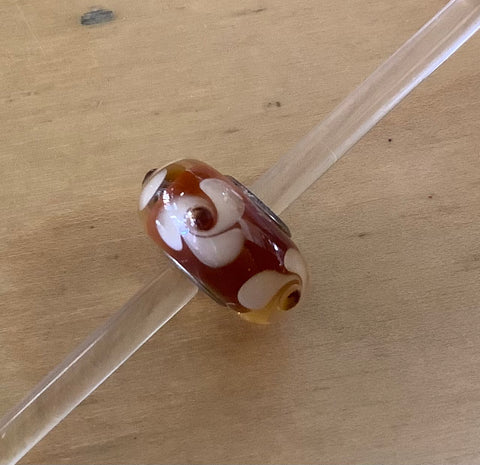 Unique Trollbeads Amber with cream flower and textured dot