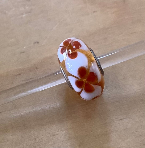 Unique Trollbeads white flower with brown middle