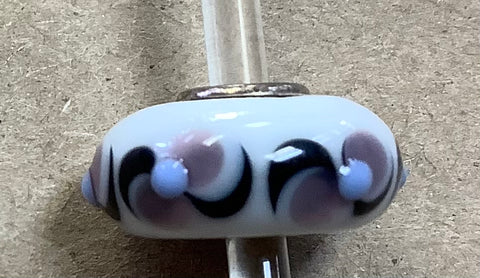 Troll Unique White Bead with Purple and Black Designs surrounding the Bead