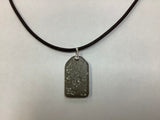 Concrete glow in the dark necklaces by Joe