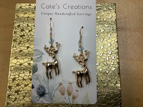 Gold deer earrings w/ light blue stone by Caitlin