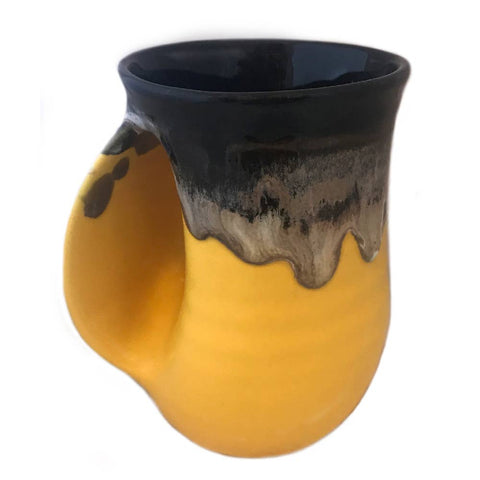 Clay in Motion - The Original Handwarmer Mug: Black Yellow / Left Hand