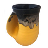 Clay in Motion - The Original Handwarmer Mug: Black and Brown / Left Hand